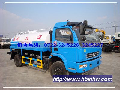 東風(fēng)康霸灑水車(chē),裝水5-6噸,康機140馬力.銷(xiāo)售熱線(xiàn):13908665336